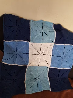 Hand knitted and crocheted baby wear and blankets of all sizes