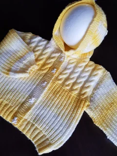 Hand crocheted and knitted baby garments and blankets of all shapes and sizes