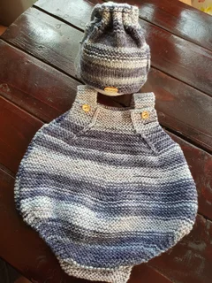 Hand crocheted and knitted baby garments and blankets of all shapes and sizes