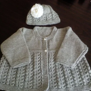 Hand crocheted and knitted baby garments and blankets of all shapes and sizes