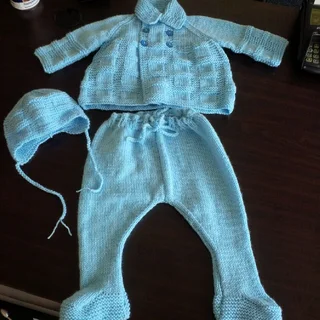 Hand crocheted and knitted baby garments and blankets of all shapes and sizes