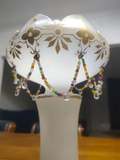 ANTIQUE MILK GLASS EPERGNE VASES, GOLD HAND PAINTED WITH BIDS.