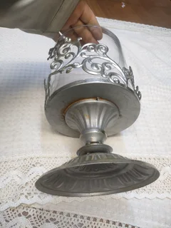 Antique glass and iron decorations vase.