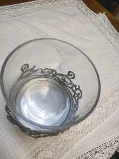 Antique glass and iron decorations vase.