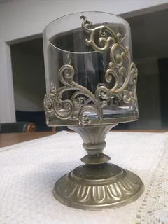 Antique glass and iron decorations vase.
