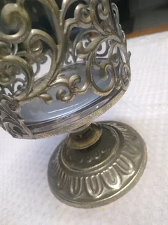 Antique glass and iron decorations vase.