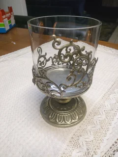 Antique glass and iron decorations vase.