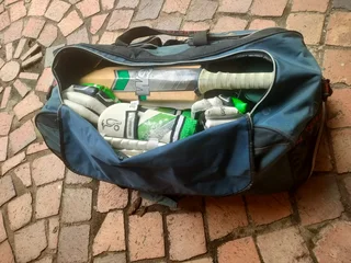 Medium size Kookaburra cricket kit with bag.