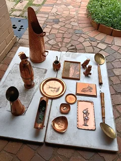 17 items of Cooper ornaments for sale