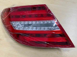 Mercedes-Benz C-Class (W204) facelift model left-side LED tail light assembly.