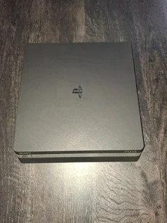  For Sale: PS4 Slim 500GB – Excellent Condition! 