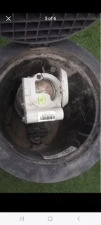 Water meter in a purpose made polycarbonate  enclosure in good condition with all fittings