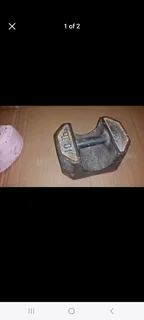 Two heavy door stop weights in good condition  Sell both together