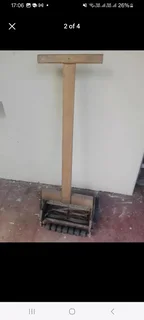 Push Lawn mower - Folbate XL with a strong comfortable wooden handle.  Very sharp blade