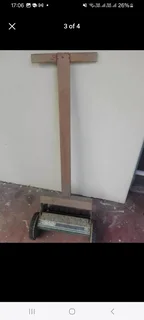 Push Lawn mower - Folbate XL with a strong comfortable wooden handle.  Very sharp blade