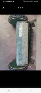 Push Lawn mower - Folbate XL with a strong comfortable wooden handle.  Very sharp blade