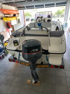 Boat with outboard motor
