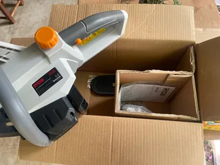 Ryobi Cordless Chainsaw and Angle Grinder