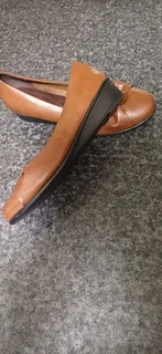 Flat shoes 2 pairs  brown and black from Miladys for R300 for both