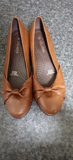 Flat shoes 2 pairs  brown and black from Miladys for R300 for both
