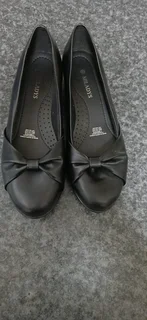Flat shoes 2 pairs  brown and black from Miladys for R300 for both