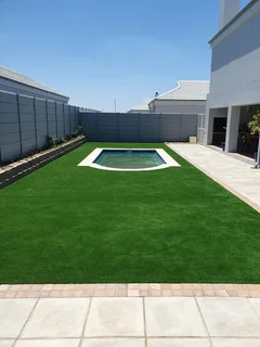Transform your space with low maintenance Synthetic grass. Call Dura Pave on 082 723 0293.