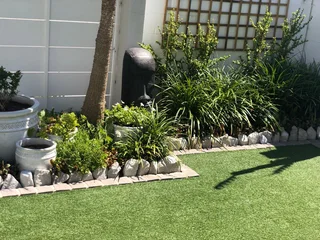 Green grass, timeless cobblestones - Perfect  match,  Call Dura Pave  on 082 723 0293 for a quote.