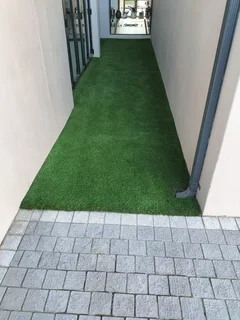 Green grass, timeless cobblestones - Perfect  match,  Call  Dura Pave  on  082 723 0293 for a quote.