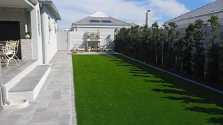 Green grass, timeless cobblestones - Perfect  match,  Call  Dura Pave  on  082 723 0293 for a quote.