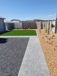 Green grass, timeless cobblestones - Perfect  match,  Call  Dura Pave  on  082 723 0293 for a quote.