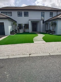 Transform your space with low maintenance Artificial grass. Call Dura Pave on 082 723 0293.
