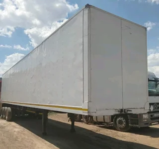 CLOSED BODY TRIAXLE TRAILER ON CLEARANCE SPECIAL