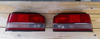 Mazda 323 sting/midge tail lights