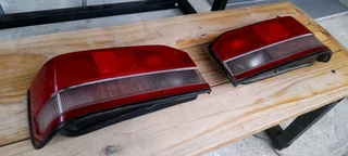 Mazda 323 sting/midge tail lights