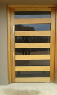 Carpenter Umhlanga, wooden door hanging and repairs, pivot doors