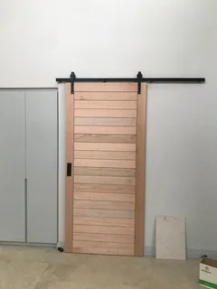 Carpenter, wooden door hanging and repairs, pivot doors, wooden windows