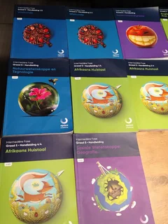 10 Textbooks in Afrikaans, as issued by Impaq Online School (for Grade 5&#39;s)