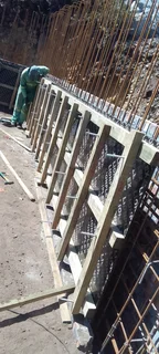 Concrete shuttering and steel reinforcement