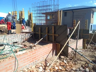 Concrete shuttering and steel reinforcement