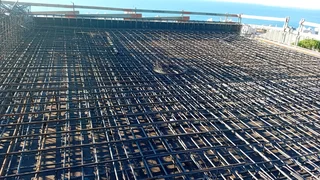 Concrete shuttering and steel reinforcement