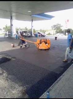 Tar Surfacing And Paving