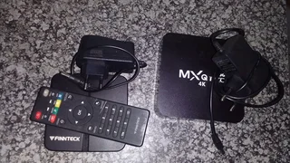 Selling 2 Faulty smart tv boxes including power cables and 1 remote.R200