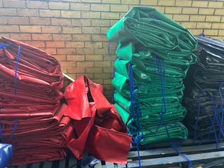 CORNER PLATES , STRAPS , RATCHETS ,STOP BLOCKS, TARPAULINS N CARGO NETS