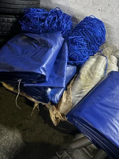 CORNER PLATES , STRAPS , RATCHETS ,STOP BLOCKS, TARPAULINS N CARGO NETS