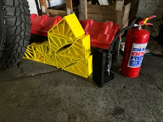 CORNER PLATES , STRAPS, RATCHETS, SATURNS, CARGO NETS , CHAINS, LOAD BINDERS ETC