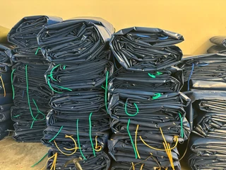 CORNER PLATES , STRAPS, RATCHETS, TARPAULINS SATURNS , CARGO NETS , CHAINS, FIRE EXTINGUISHERS ETC