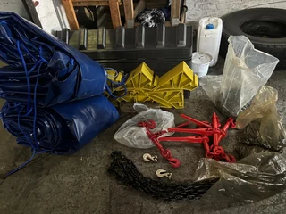 CORNER PLATES , STRAPS, RATCHETS, TARPAULINS SATURNS , CARGO NETS , CHAINS, FIRE EXTINGUISHERS ETC