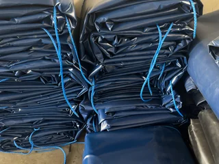 TARPAULINS, SATURNS , NETS , STOP BLOCKS , STRAPS , RATCHETS, etc