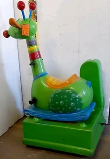 Antique Coin Operated Childrens Ride On Green Reindeer.