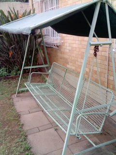 Garden swing chair with awning.